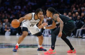 A ascensão inesperada do Streaking Nets atinge novos patamares com vitória sobre Timberwolves O guarda do Brooklyn Nets, Cam Thomas (24), segura a bola enquanto o guarda do Minnesota Timberwolves, Rob Dillingham, defende.