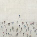 People connected by data points to show a graph.