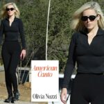A desprezada Olivia Nuzzi permanece estóica na sessão de fotos dos paparazzi depois de reclamar de ter sido seguida