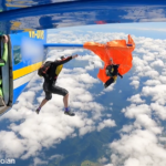 O piloto inicialmente não sabia que um paraquedista havia sido pego no avião em Tully, Queensland, de acordo com o relatório final do ATSB.