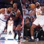 Mitchell Robinson #23 passa a bola para o armador do New York Knicks, Tyler Kolek #13, durante o quarto período.