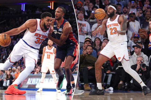 Mitchell Robinson #23 passa a bola para o armador do New York Knicks, Tyler Kolek #13, durante o quarto período.