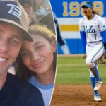 Tom Brady e Maya Brady sorrindo para uma selfie em um evento esportivo.