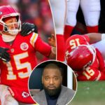 O linebacker do Los Angeles Chargers, Odafe Oweh (98), demite o quarterback do Kansas City Chiefs, Patrick Mahomes (15), durante o segundo tempo no GEHA Field no Arrowhead Stadium.