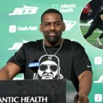 O coordenador defensivo dos Jets, Chris Harris, fala à mídia.