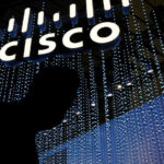 An illuminated logo above the Cisco Systems Inc. stand on the opening day of the MWC Barcelona at the Fira de Barcelona venue in Barcelona, Spain, on Monday, Feb. 28, 2022. Over 1,800 exhibitors and attendees from 183 countries will attend the annual event, which runs from Feb. 28 to March 3. Photographer: Angel Garcia/Bloomberg
