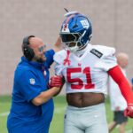 Brian Daboll (esquerda) e Abdul Carter (dir.)