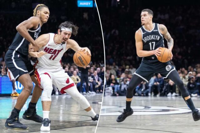 Noah Clowney nº 21 do Brooklyn Nets defende contra Jaime Jaquez Jr. nº 11 do Miami Heat durante o segundo tempo no Barclays Center, quinta-feira, 18 de dezembro de 2025, no Brooklyn, NY. 