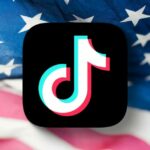 Spinoff do TikTok, de propriedade dos EUA, acordado – ainda usará algoritmo chinês | Logotipo do TikTok mostrado na bandeira dos EUA