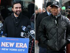 Eric Adams se encontra com Zohran Mamdani pela primeira vez enquanto o ex-rival deve assumir as rédeas Eric Adams, prefeito de Nova York, vestindo uma jaqueta preta e um boné preto onde se lê