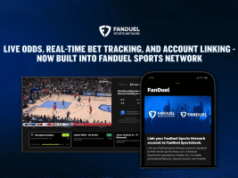 FanDuel e FanDuel Sports Network lançam rastreamento de apostas em jogos da NBA e NHL FanDuel e FanDuel Sports Network lançam rastreamento de apostas em jogos da NBA e NHL. Gráfico promocional da FanDuel Sports Network anunciando “Probabilidades ao vivo, rastreamento de apostas em tempo real e vinculação de contas agora integrados à FanDuel Sports Network”. A imagem mostra um jogo de basquete ao vivo em uma tela de TV com probabilidades de apostas e sobreposições de status de apostas, ao lado de um smartphone exibindo o aplicativo FanDuel e uma mensagem sobre como vincular uma conta FanDuel Sports Network ao FanDuel Sportsbook. Os logotipos FanDuel aparecem em um fundo azul.