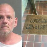 Mugshot de um homem careca, com barba grisalha e olhos azuis, vestindo uma camiseta branca.