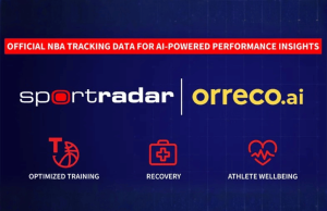 Jogadores da NBA obterão maiores dados biométricos por meio do acordo entre Orreco e Sportradar Jogadores da NBA obterão maiores dados biométricos por meio do acordo entre Orreco e Sportradar. Um gráfico anunciando uma parceria entre Sportradar e Orreco.ai. O banner superior diz “Dados oficiais de rastreamento da NBA para insights de desempenho baseados em IA”. Abaixo estão os logotipos Sportradar e Orreco.ai em um fundo azul escuro. Três ícones vermelhos representam treinamento otimizado, recuperação e bem-estar do atleta.