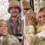 Livvy Dunne e Paul Skenes se aconchegam perto da árvore do Rockefeller Center durante um lindo encontro de Natal