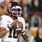 Marcel Reed #10 of the Texas A&M Aggies looks to pass during the first quarter against the Texas Longhorns