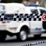 O motorista foi preso e levado à delegacia de Parramatta, onde foi acusado de duas acusações de relação sexual sem consentimento.