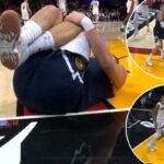 Nikola Jokic, do Nuggets, cai no chão com uma lesão no joelho que parece assustadora