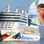 O navio de cruzeiros AIDAdiva navega no rio Tejo após sair do terminal de cruzeiros de Lisboa.