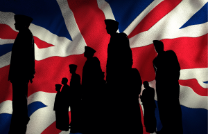 O MOD do Reino Unido está desenvolvendo uma nova política que se concentra na redução de danos do jogo para veteranos e membros em serviço O MOD do Reino Unido está desenvolvendo uma nova política que se concentra na redução dos danos do jogo para veteranos e membros em serviço. Silhuetas de militares britânicos em frente a uma grande bandeira Union Jack, simbolizando as forças armadas e os veteranos do Reino Unido.