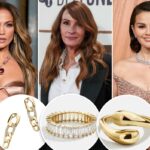 Um colar de ouro com letra maiúscula