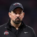 Head coach Ryan Day of the Ohio State Buckeyes looks on during warmups before the 2025 Big Ten Football Championship against the Indiana Hoosiers at Lucas Oil Stadium on December 06, 2025 in Indianapolis, Indiana.