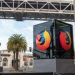 Mozilla Firefox logo outside of San Francisco location with palm tree in backgroundMozilla Firefox logo outside of San Francisco location with palm tree in background