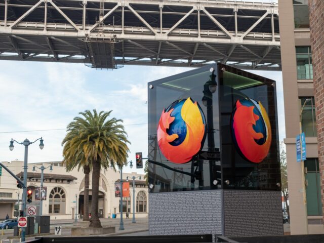 Mozilla Firefox logo outside of San Francisco location with palm tree in backgroundMozilla Firefox logo outside of San Francisco location with palm tree in background