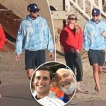 O sombrio Jake Reiner é visto em uma caminhada na praia com a namorada após a trágica morte dos pais Rob e Michele