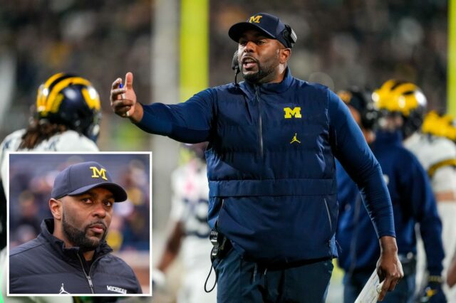 O técnico demitido do Michigan, Sherrone Moore, supostamente atacou uma Sherrone Moore, técnico do Michigan Wolverines, gesticula em campo.