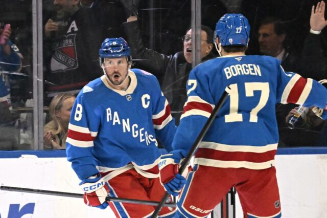 O vencedor do OT de JT Miller impulsiona o Rangers O pivô do Rangers, JT Miller (8), reage após marcar um gol contra os Canadiens.
