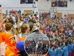 Os fãs de basquete da Taylor University invadem a quadra como parte da tradição icônica da ‘Noite Silenciosa’ durante a vitória por 118-33 Os fãs de basquete da Taylor University invadem a quadra como parte da tradição icônica da 'Noite Silenciosa' durante a vitória por 118-33