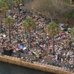 Os foliões desafiam o medo do terror para se reunirem nas celebrações do NYE em Sydney
