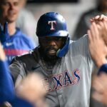 Phillies Boss sugere cortar laços com Gold Glover após a assinatura de Adolis Garcia