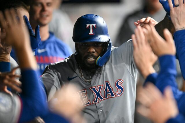 Phillies Boss sugere cortar laços com Gold Glover após a assinatura de Adolis Garcia
