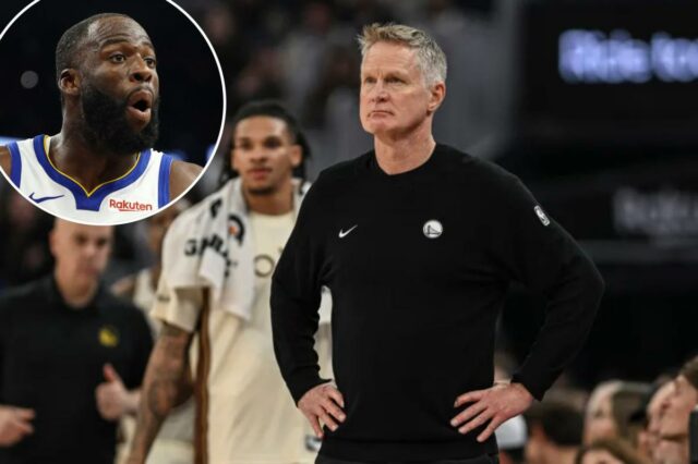 O técnico do Golden State Warriors, Steve Kerr, observando durante um jogo.