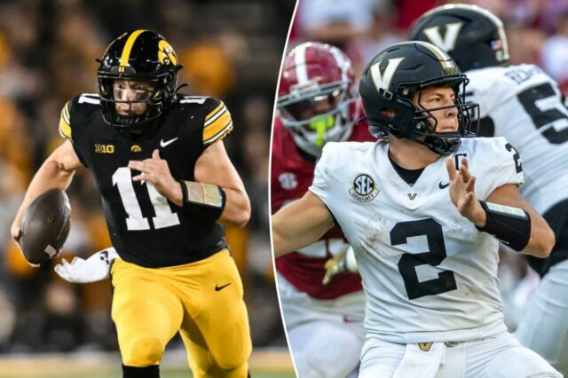 O quarterback do Iowa Hawkeyes, Mark Gronowski (11), luta por jardas.