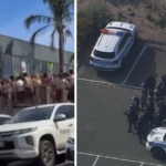 A visão mostra centenas de jovens banhistas invadindo a loja Woolworths.