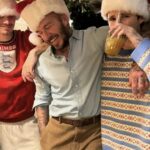 David Beckham e seus filhos Romeo e Cruz pareciam alegres ao vestir chapéus de Papai Noel antes do Natal - enquanto o Brooklyn continua afastado da família