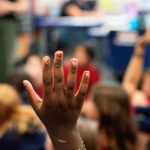 Education Secretary Linda McMahon listens as President Donald Trump speaks with reporters as he signs an executive order in the Oval Office of the White House, Wednesday, April 23, 2025, in Washington. (AP Photo/Alex Brandon)