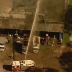 Restos mortais encontrados em incêndio em armazém de caridade em Brisbane