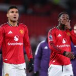 Casemiro celebrates with Amad and Bruno Fernandes
