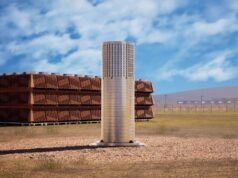 Startup nuclear Last Energy arrecada US$ 100 milhões para seu microrreator revestido de aço A rendering shows Last Energy's reactor standing in a field before an industrial plant.