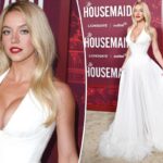 Sydney Sweeney aumenta a temperatura com um vestido branco profundo na estreia de 'Housemaid'