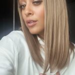 Tia Mowry mostra sua figura tonificada em um elegante maiô preto