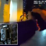 Uma câmera corporal Axon acoplada ao colete tático de um oficial.