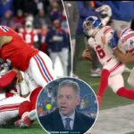 Jaxson Dart, do New York Giants, é abordado por Harold Landry III, do New England Patriots.