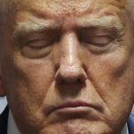 Desenho animado de Mike Luckovich