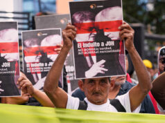 Trump se faz de bobo sobre traficante de drogas que ele perdoou ARQUIVO - O presidente de Honduras, Juan Orlando Hernandez, fala durante a cerimônia de abertura da Conferência das Nações Unidas sobre Mudanças Climáticas COP26 em Glasgow, Escócia, segunda-feira, 1º de novembro de 2021. Andy Buchanan/Pool via AP, Arquivo)