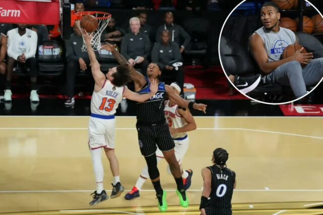 Tyler Kolek faz uma declaração sobre os Knicks nas semifinais O armador do New York Knicks, Tyler Kolek (13), chuta sobre o atacante do Orlando Magic, Paolo Banchero (5).