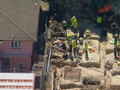 Um preso e outro ferido no colapso do muro de contenção em Brisbane Um preso e outro ferido no colapso do muro de contenção em Brisbane